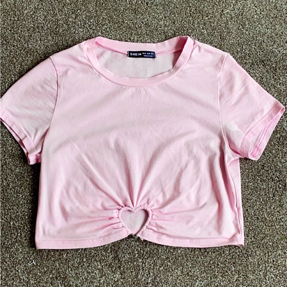 Size Medium, Pink crop top with heart cut out. Only worn a few times